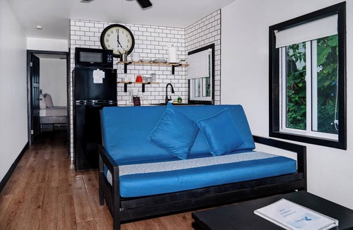 San Pedro Hotel | Top-Floor Corner Beachfront Suite with Reef Views | Aqua Vista – Suite 6