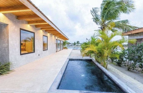 Placencia Villa | Tranquil villa with water views, private pool, deck dining, WiFi & AC