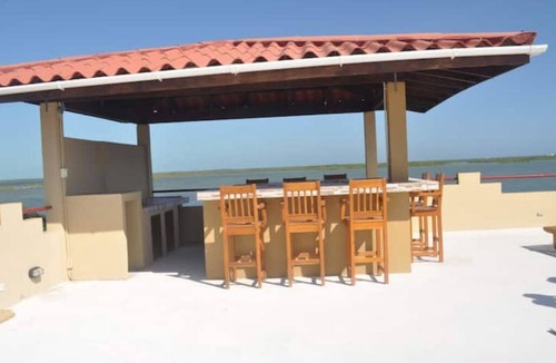 San Pedro Villa | Tranquility Cove Villa: Rooftop Palapa Bar & Dunk Pool