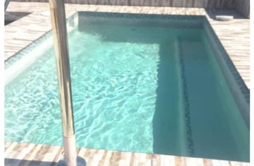 San Pedro Villa | Tranquility Cove Villa: Rooftop Palapa Bar & Dunk Pool