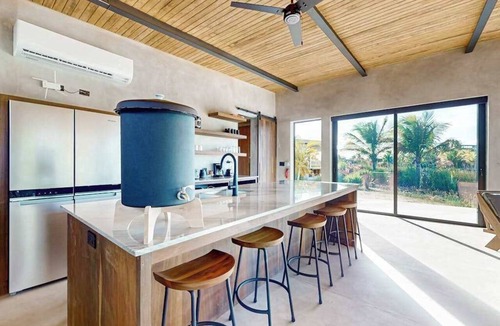 Placencia Villa | Waterfront villa with private pool, furnished deck & gas grill