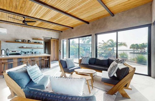 Placencia Villa | Waterfront villa with pool, spacious deck, dog-friendly & office space