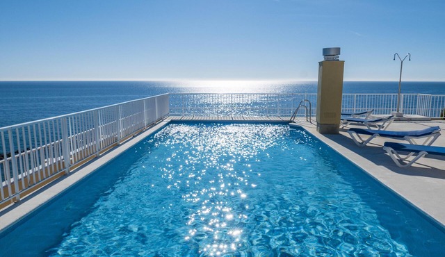 Beachfront Condo in Marbella Center with 2 Pools & Parking in Marbella