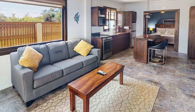 Beachfront suite with reef views - pool, bikes, canoes, dock, and grill access