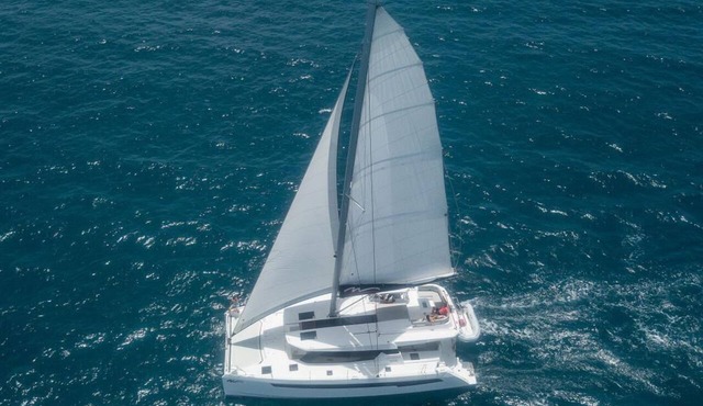 Caribbean Bliss: Sun-soaked Sailing Adventure from Placencia, Belize