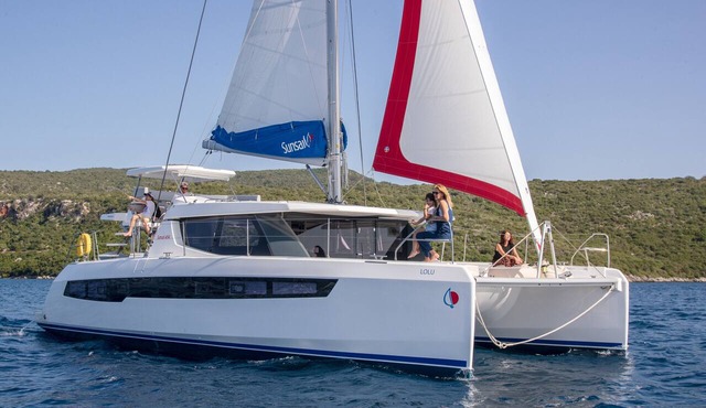Caribbean Bliss: Sun-soaked Sailing Adventure from Placencia, Belize