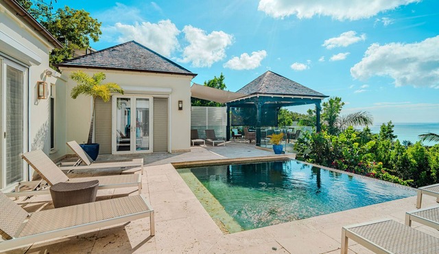 Exceptional Hillside Haven in Jolly Harbour