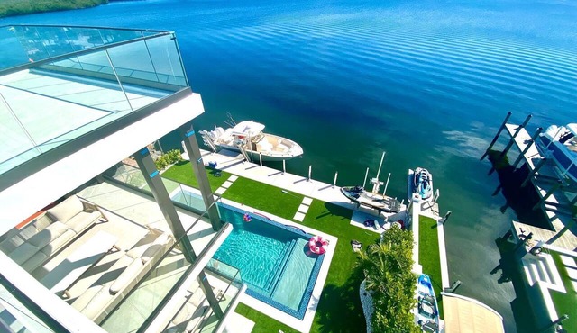 Experience the ultimate Florida Keys getaway in this modern waterfront estate in Key Largo