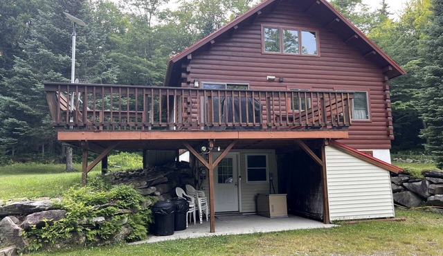 Fantastic Lakefront Wooden Cabin Settled Between Trees in Stratton, Vermont in Stratton