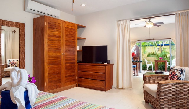 Modern, comfortable, well-appointed apartment with private garden courtyard. in Puerto Morelos