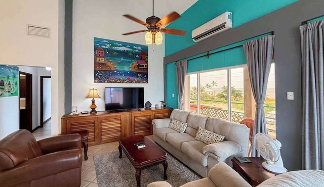 Ocean-view home with balcony, swimming pool & central AC