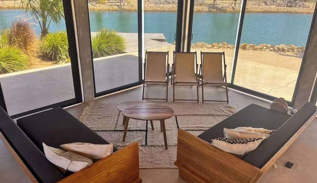 Relaxing tropical villa with private plunge pool, open layout & canal water view