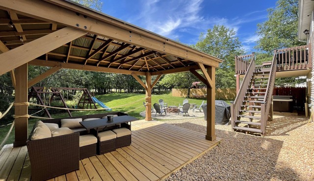Spacious Pocono Home w/A/C/Hot Tub/FirePit/Gazebo/Playground/Grill in Long Pond