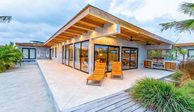 Waterfront villa with splash pool, private terrace, beach access & WiFi