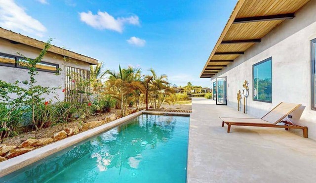 Waterfront villa with private pool, furnished deck & gas grill