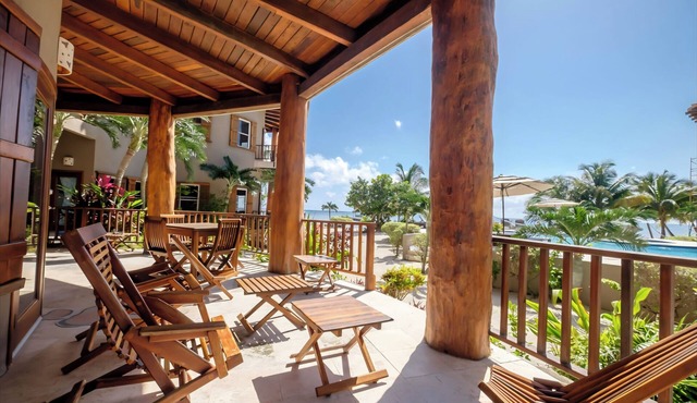 Welcome in the island breeze or head outside to sit on the large deck,