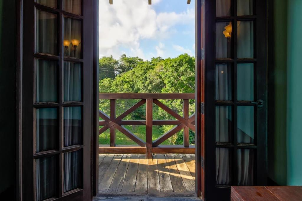 Bullet Tree Falls Hotel | Toucan Suite @ Mahogany Hall