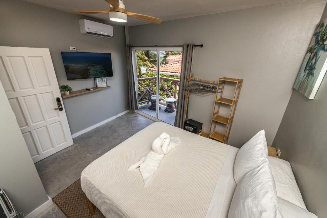 San Pedro Hostel | Sandbar Beachfront Hotel & Hostel Restaurant