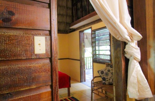 Bullet Tree Falls Hotel | Cohune Palms River Cabanas