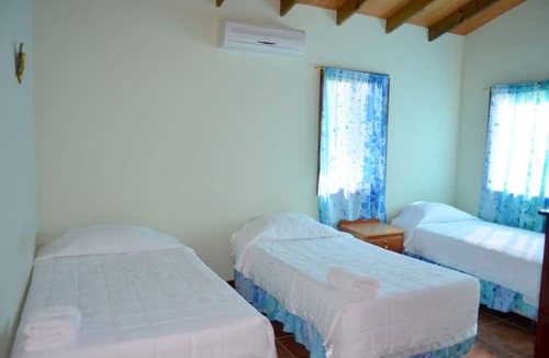 San Ignacio Hotel | The Log Cab Inn Resort