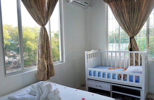 Belize City Apartment | See Belize Waterside Sea View 2-bedroom Apartment w Balcony, Pool & Deck 2nd FL