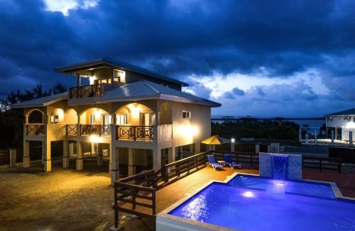 Plantation Villa | Elegant Beachfront Villa Pool & Beach Family Fun