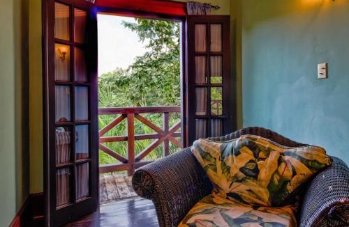 Bullet Tree Falls Hotel | Toucan Suite @ Mahogany Hall