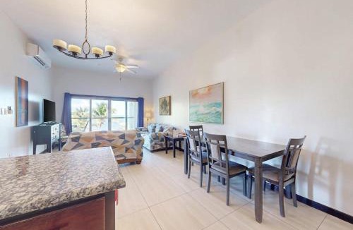 San Pedro House | Serene oceanfront condo with shared pool ocean view WiFi & partial AC