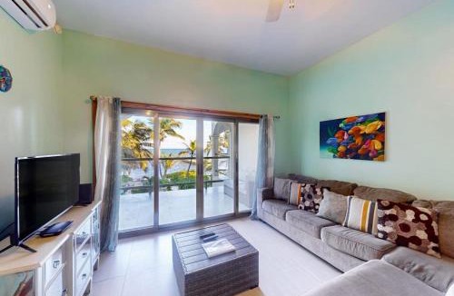 San Pedro House | Relaxing condo with shared pool ocean views partial AC & WiFi