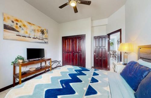 San Pedro House | Beachfront condo with balcony sea view partial AC pool dock & kayaks