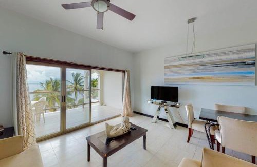 San Pedro House | Beachfront condo with ocean views WiFi partial AC & shared pool dock kayaks