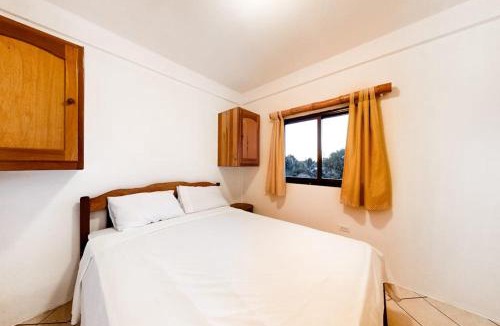 Caye Caulker Apartment | Cozy Suite for Two with WiFi AC Shared Pool Grill & Sunsets from the Rooftop
