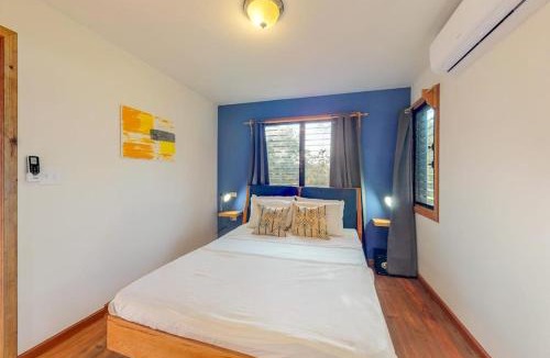 Surfside House | Three forest cabanas with verandas hammocks WiFi & partial AC - walk to beach