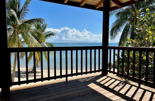Placencia House | Beachfront Home Kissin' the Caribbean - BELLA SWAY