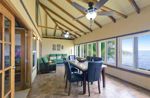 Sittee River House | Entire Beach Home with Sunroom, Pool, Bikes, Paddleboards, BBQ, Snorkeling & more