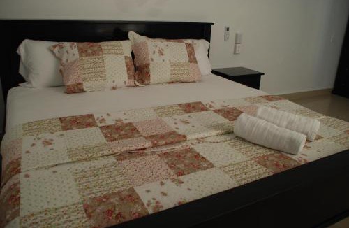 San Pedro Hotel | Hotel Coastalbay 2 & Golf Cart Rental
