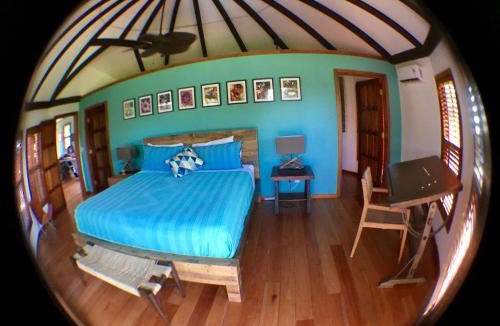 Bullet Tree Falls Villa | Exotic High End Unique Off-The-Grid Treehouse, steps away from the Mopan River!