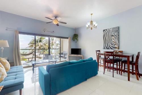 Beachfront condo with balcony sea view partial AC pool dock & kayaks